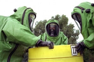 Biohazard Cleaning service in green hazmat suits