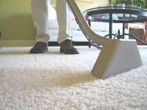 Carpet cleaning service cleaning white carpet